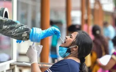 24 घंटों में कोरोना के 1,27,510 नए केस मिले