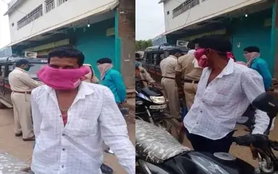 पुलिस के डर से बीवी के पेटीकोट से ढंका पति ने चेहरा