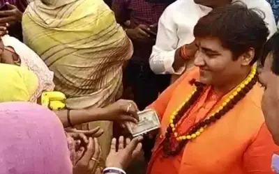 साध्वी ने भिखारियों में बांटे पांच-पांच सौ के नोट