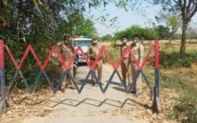 यूपी में 31 इलाके सील, घर से झांकने की भी इजाजत नहीं