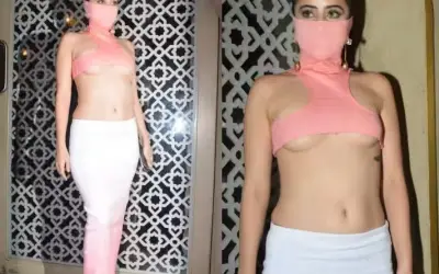उर्फी ने टॉप से कवर किया चेहरा